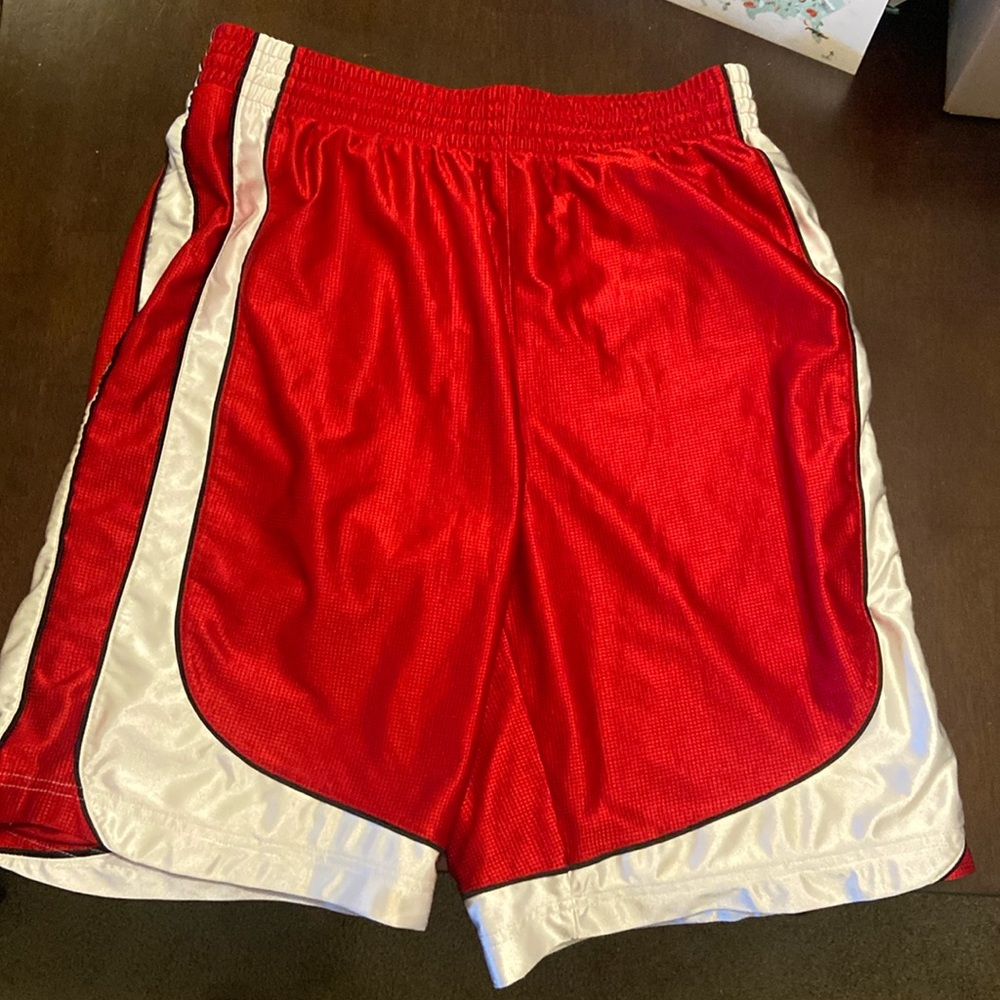 Size extra large, red, black and white basketball shorts